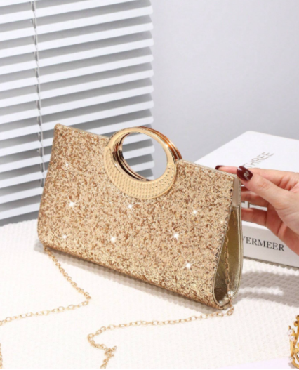 Cartera de Mano Dorada con Brillos y Asa Metálica Circular