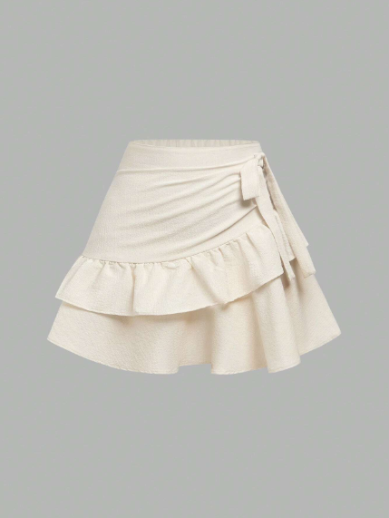 Minifalda casual y versátil para adolescentes con volantes en el bajo, lazo decorativo y unicolor