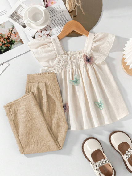 Conjunto para niña blusa con aplique de mariposas y pantalón largo