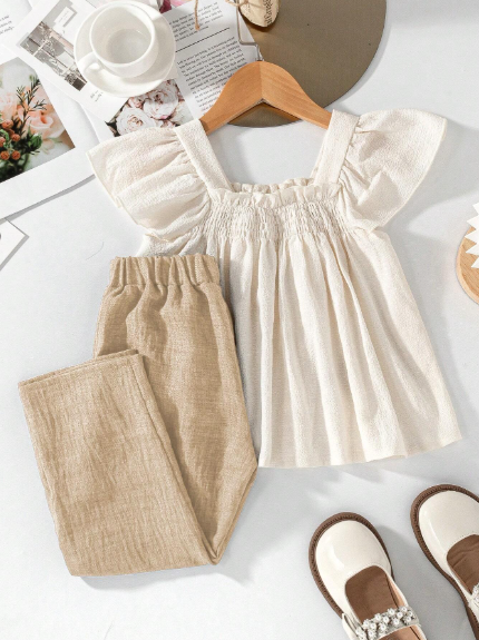 Conjunto para niña blusa con aplique de mariposas y pantalón largo