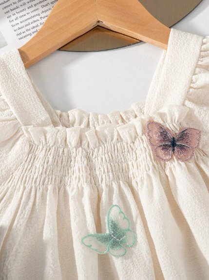 Conjunto para niña blusa con aplique de mariposas y pantalón largo