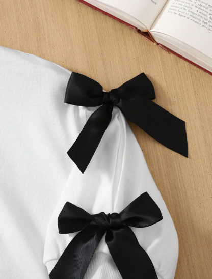 Camiseta de manga media con cuello redondo holgada de punto blanca con decoración de lazo para adolescentes
