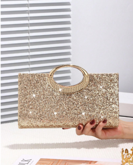 Cartera de Mano Dorada con Brillos y Asa Metálica Circular
